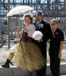 Bride and Groom with one of the sons