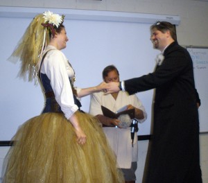 The Bride receives her ring.