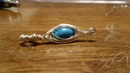 "God's Eye", turquoise and silver craft wire